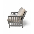 Side view of eco lounge outdoor 2 seater deep seating sofa with cushions made from recycled plastic