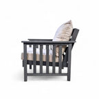 side view of eco lounge outdoor deep seating sofa chair with cushions made from recycled plastic